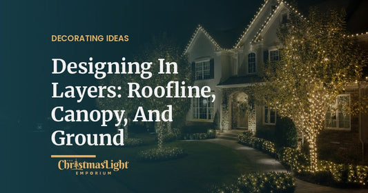 Suburban home at night with warm white C9 lights on the roofline, wrapped trees in the yard, and glowing shrubs along the walkway