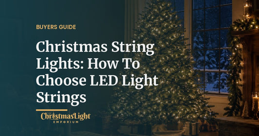 A tall fir Christmas tree in a dark living room at night, evenly covered in warm white LED mini lights with clear glass ornaments, beside a large window showing falling snow and a lit garland on the mantel