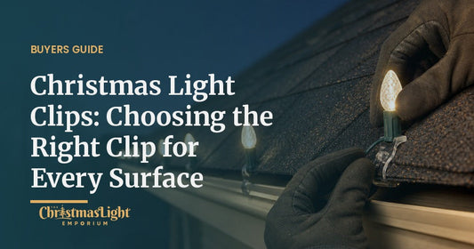Installing a warm white C9 bulb into a shingle tab clip on a roofline at dusk