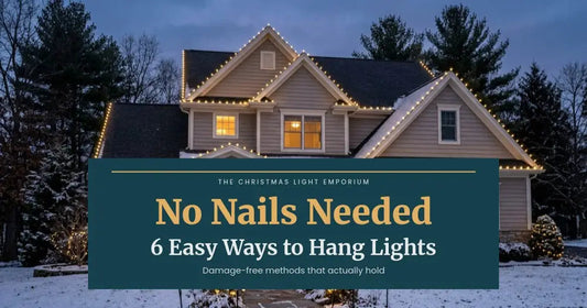 Snowy home with warm white roofline lights clipped along gutters and peaks at dusk. Branded title card from The Christmas Light Emporium reads: No Nails Needed — 6 Easy Ways to Hang Lights.