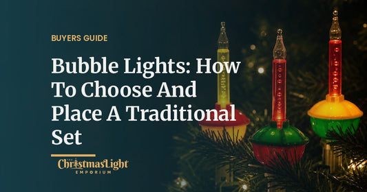 Traditional C7 bubble lights with red, green, and yellow bases glowing on tree branches at night