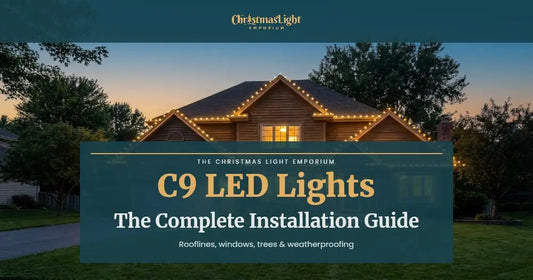 Title image of a two-story suburban home at dusk with warm white C9 LED Christmas lights evenly outlining the roofline and eaves. Image text reads: C9 LED Lights / The Complete Installation Guide / Rooflines, windows, trees and weatherproofing