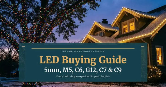Home with warm white roofline lights and a large tree wrapped in multicolor lights at dusk. Branded title card from The Christmas Light Emporium reads: LED Buying Guide — 5mm, M5, C6, G12, C7 & C9.