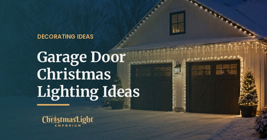 A two-car carriage-house garage at night in fresh snow, each door opening framed with warm white C7 bulbs, warm white C9 bulbs on the gable, icicle lights along the gutter, and potted evergreens wrapped in mini lights