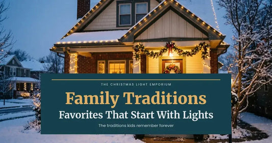 Snowy brick home with warm white roofline lights, a wreath on the door and lit shrubs at dusk. Branded title card from The Christmas Light Emporium reads: Favorite Christmas Family Traditions That Start With Lights.