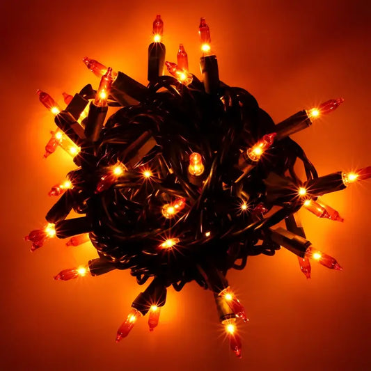 100 Orange Incandescent Mini Lights Green Wire 4’’ Spacing [CLOSEOUT] - Christmas Lights