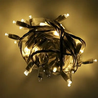 50 5mm Warm White QuadSpark® LED Strobe Christmas Lights, 6" Spacing, White Wire