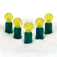 70 G12 Gold LED Christmas Lights, 4" Spacing, Green Wire