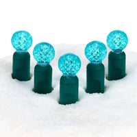 70 G12 Teal LED Christmas Lights, 4" Spacing, Green Wire