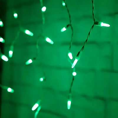 Green 70-count M5 LED icicle Christmas lights on white wire