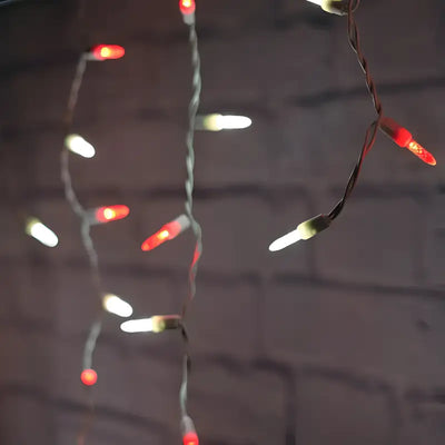 Red & Cool White 70-count M5 LED icicle Christmas lights on white wire