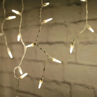 70 M5 Warm White LED Icicle Lights, White Wire