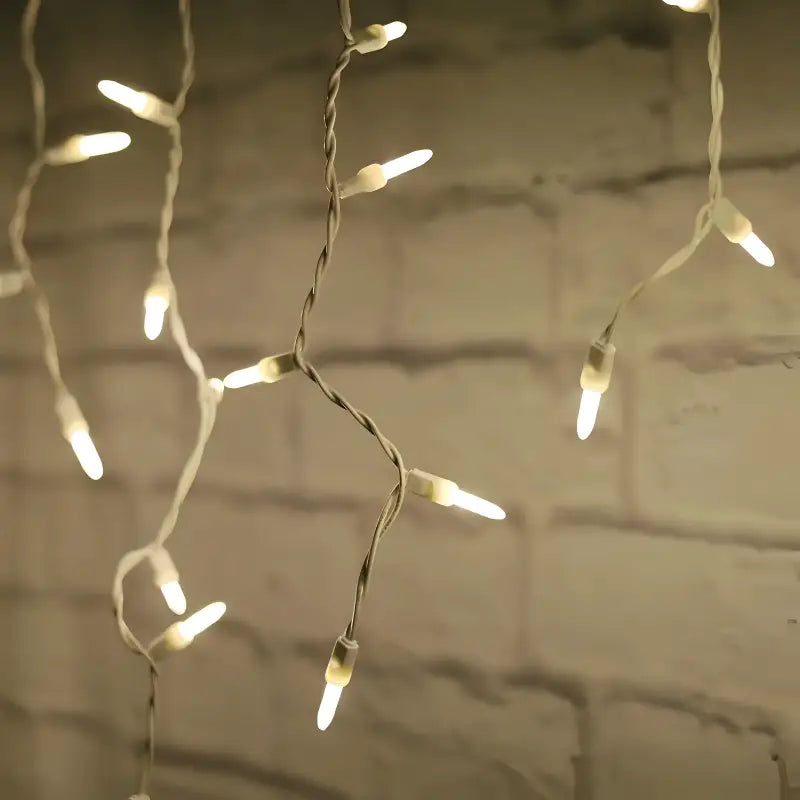 70 M5 Warm White LED Icicle Lights White Wire - Christmas Lights