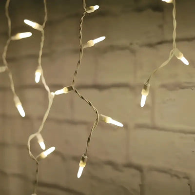 Warm White 70-count M5 LED icicle Christmas lights on white wire