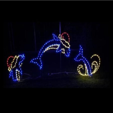 jumping dolphins with Santa hats