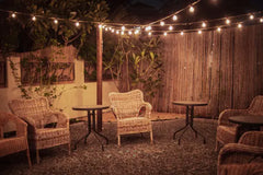 Use Christmas lights to create a cozy outdoor space