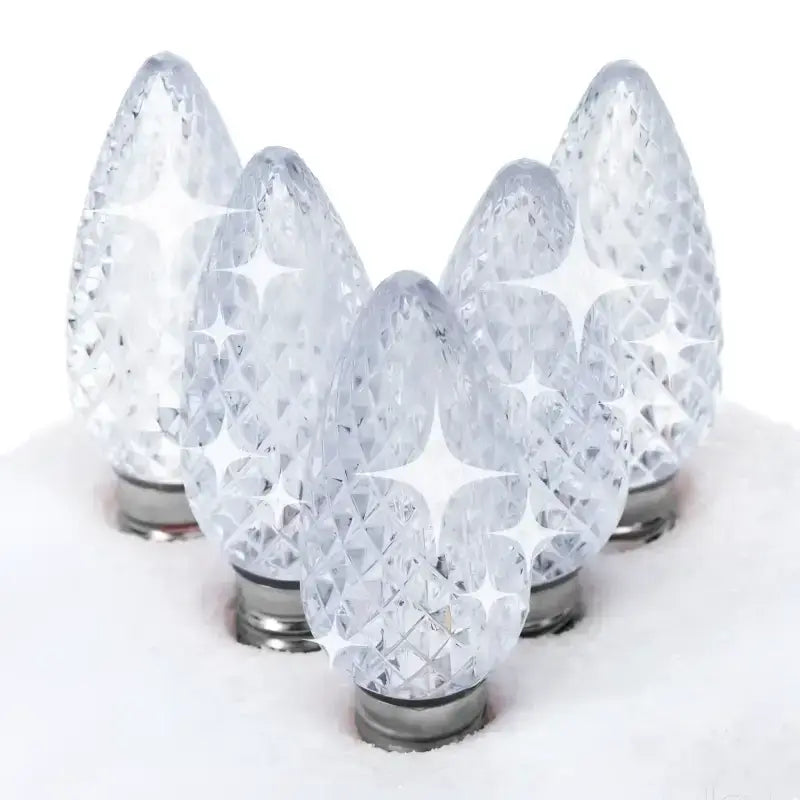 C9 Cool White Twinkle Faceted ProCore® LED Christmas light bulbs on a socket wire, showing the larger standard C9 size bulb format used on rooflines and large architectural features