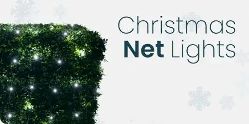 Christmas net lights with white bulbs, green foliage backdrop.