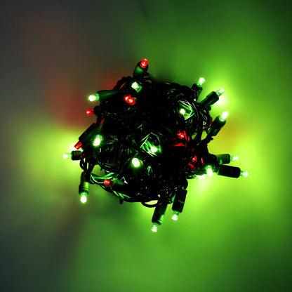 Bundled 50-light ColorCraft® Humbug 5mm LED string lit in lime green and red against a dark background