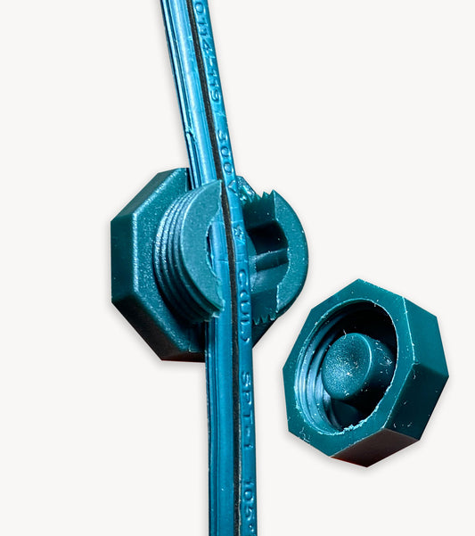 Green Lite-Netics magnetic wire clamp with the threaded cap removed showing the clamp on green wire