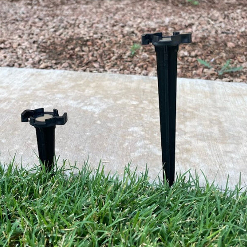 Lite-Netics 4.5-inch and 7.5-inch metal base lawn stakes side by side in grass