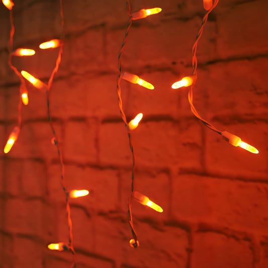 M5 Orange LED Icicle Lights 70 Bulbs 7.5ft Long White Wire - Christmas Lights