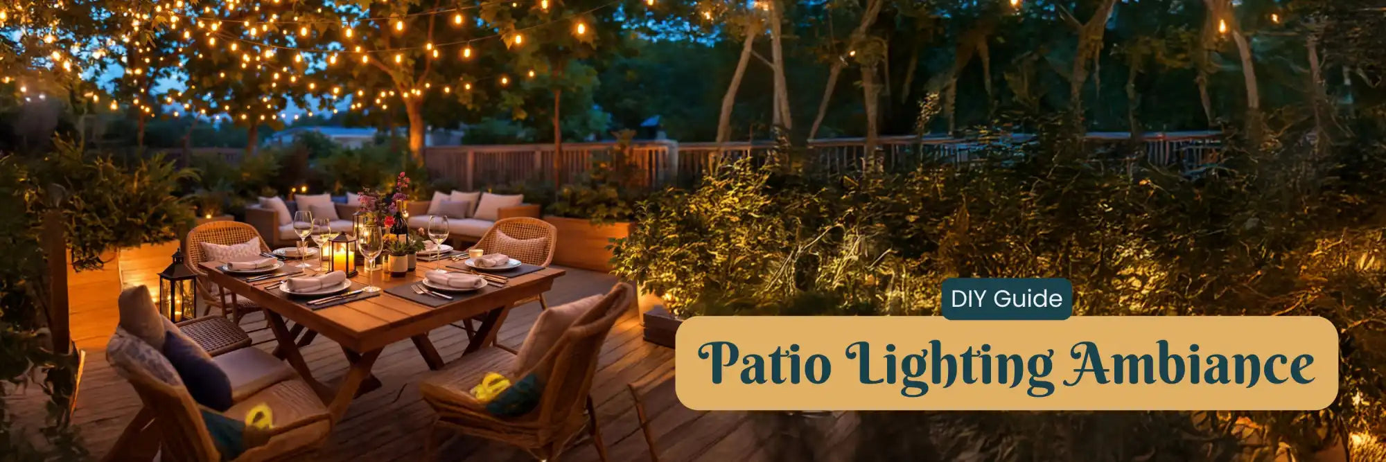 An outdoor patio set for dining and lounging, illuminated by string lights.