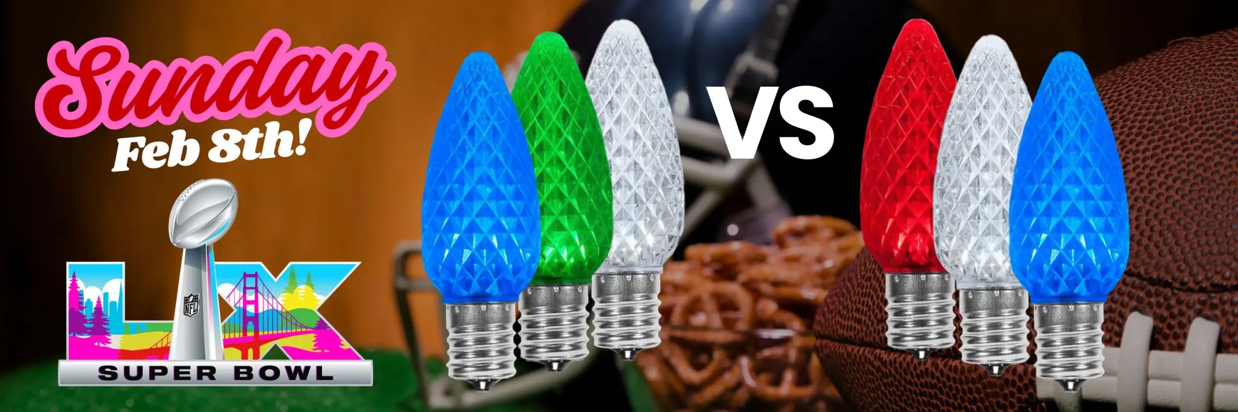 Set of four festive, faceted christmas light bulbs in blue, green, red, and clear.