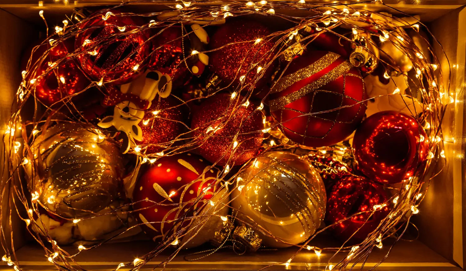 Christmas ornaments and lights in a box